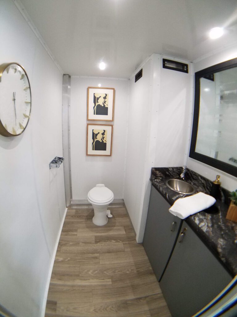 Bathroom trailer room with a granite vanity, The Lavatory Los Angeles