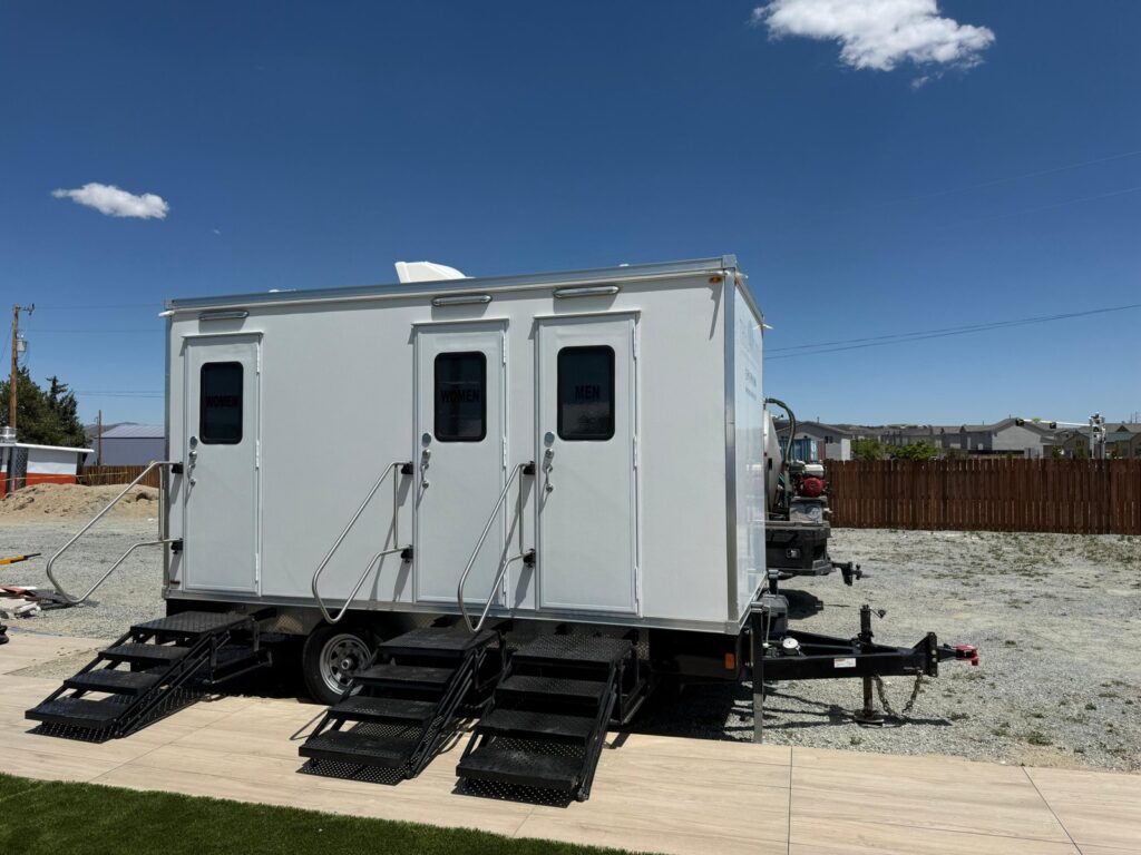 Luxury 3-station bathroom trailer with two women's doors, one men's door and fold-down steps, The Lavatory Los Angeles