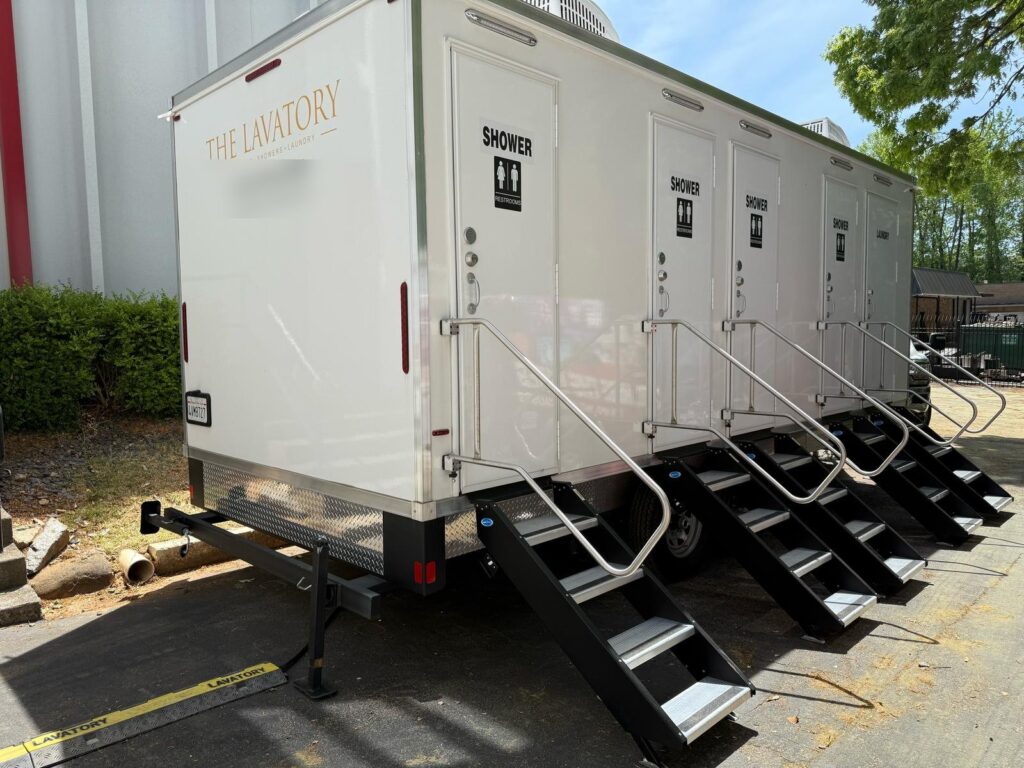 4-station combo trailer with five sets of stairs on a long-term rental outside a pro sports training facility, The Lavatory Los Angeles
