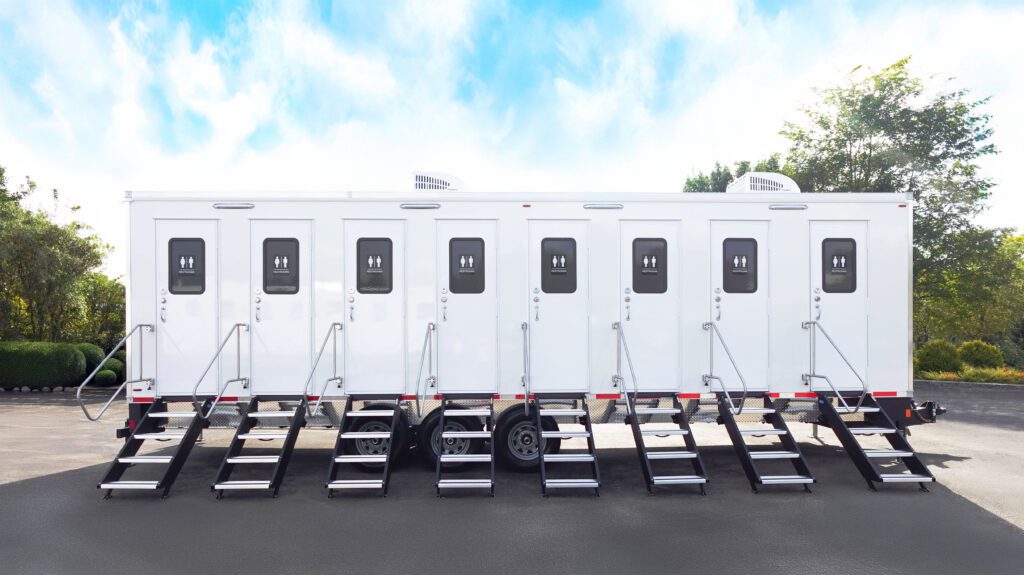 Long 8-station bathroom trailer with eight private doors and fold-down steps in a row, The Lavatory Los Angeles