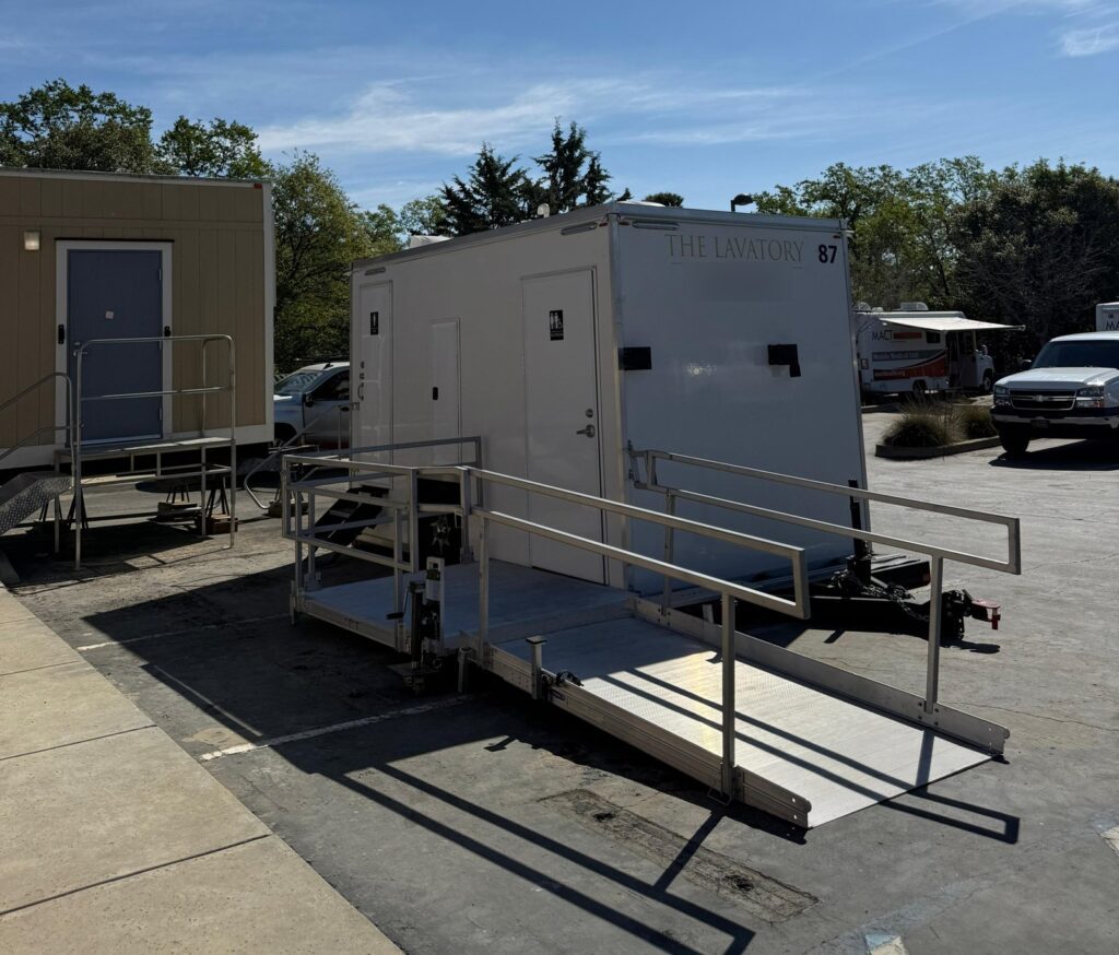 ADA plus 2 bathroom trailer with a long railed ramp beside modular buildings on a hospital campus, The Lavatory Los Angeles