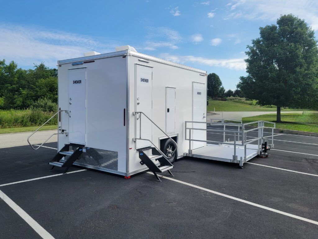 ADA plus 2 shower trailer with shower doors, steps and a platform with handrails, The Lavatory Los Angeles
