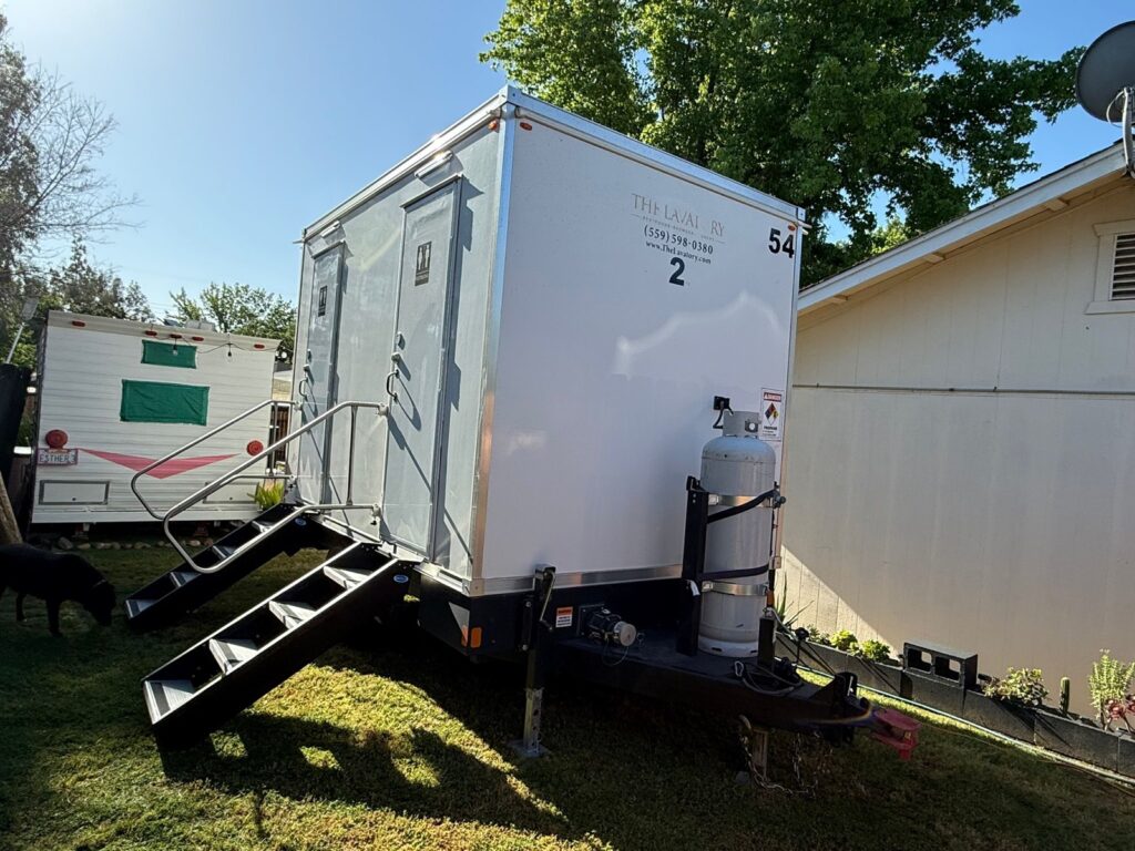 2-station combo trailer with steps on a backyard lawn for a wedding anniversary party, The Lavatory Los Angeles