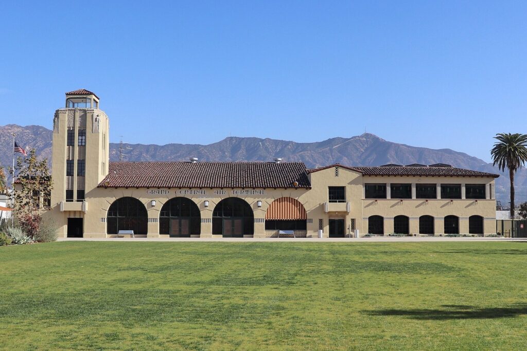 Grand Central Air Terminal building in Glendale with the San Gabriel Mountains behind it, The Lavatory Los Angeles