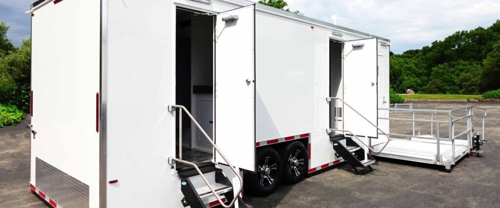 ADA plus 6 bathroom trailer with open doors and a ramp landing ready for guests, The Lavatory Los Angeles