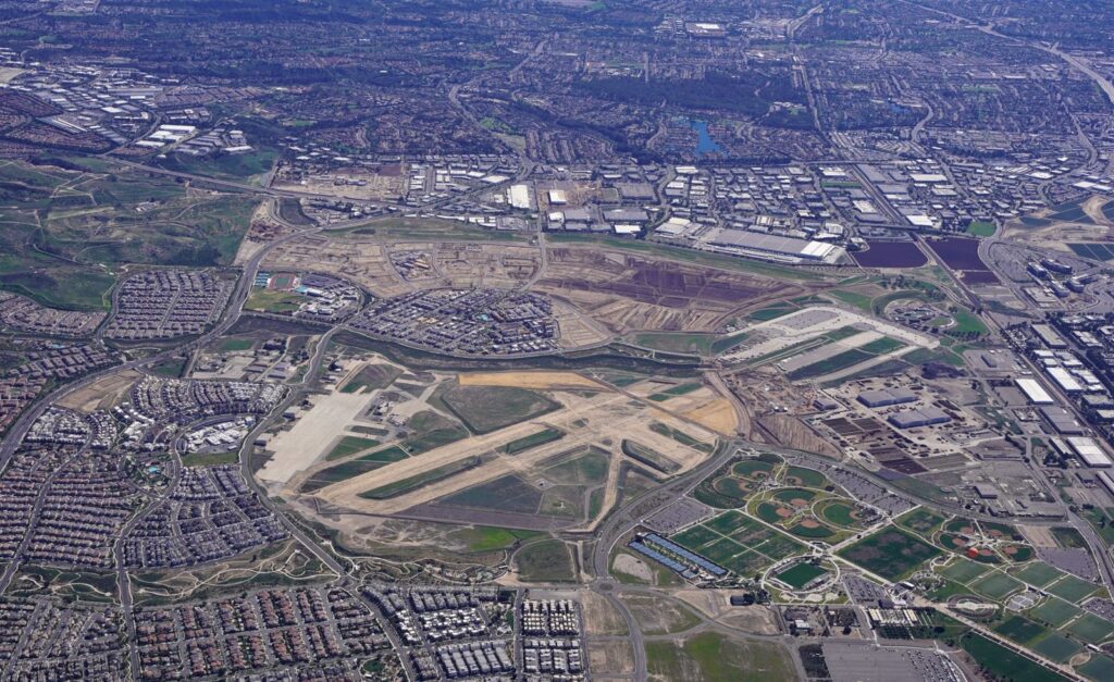 Aerial view of the old El Toro runways and new neighborhoods around the Great Park in Irvine, CA, The Lavatory Los Angeles