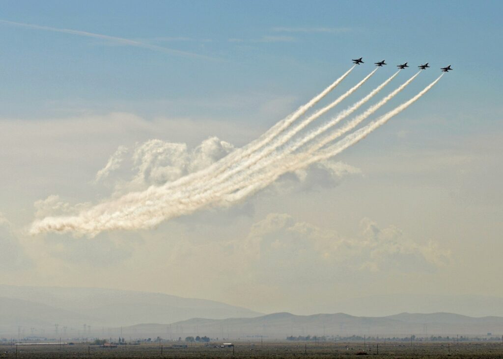 The Air Force Thunderbirds demonstration team trailing smoke over the high desert during an air show at Fox Field in Lancaster, CA, The Lavatory Los Angeles