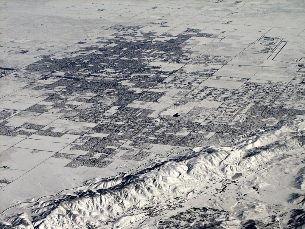 Aerial view of Lancaster, CA covered in snow after a winter storm, The Lavatory Los Angeles
