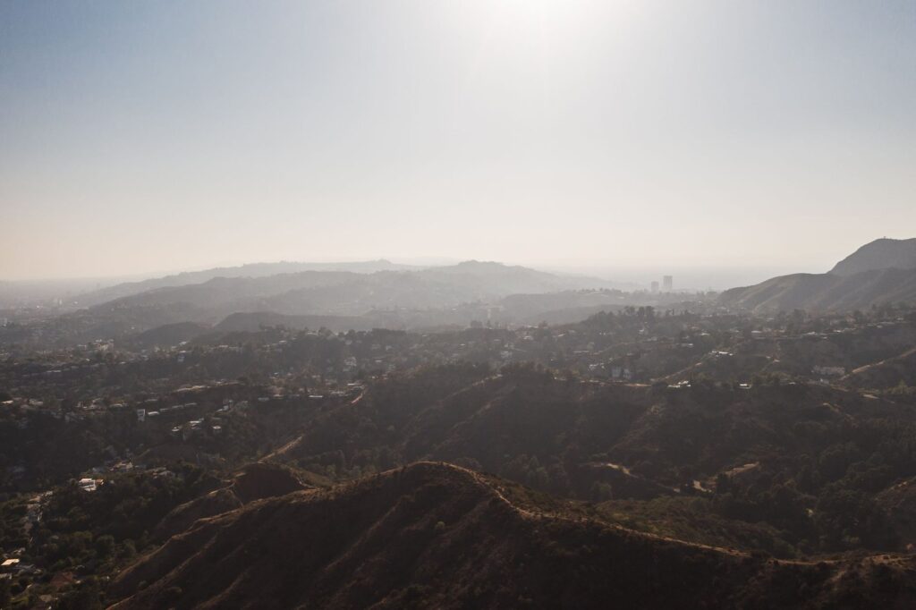 Hazy ridgelines and hillside homes in the hills above Los Angeles, The Lavatory Los Angeles