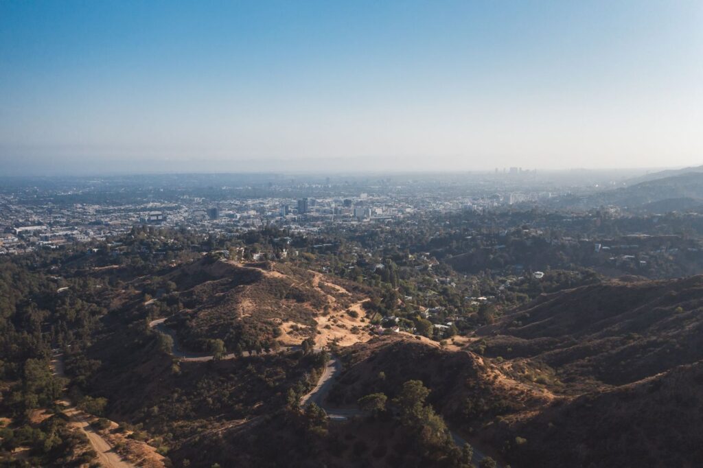 Dry brush hillsides and canyon roads above the City of Los Angeles on a hazy day, The Lavatory Los Angeles
