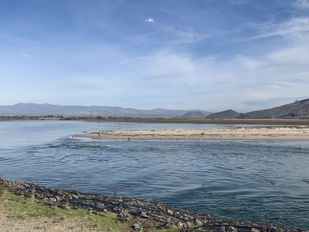Lagoon and sandbar at Naval Base Ventura County Point Mugu with mountains on the horizon near Oxnard, CA, The Lavatory Los Angeles
