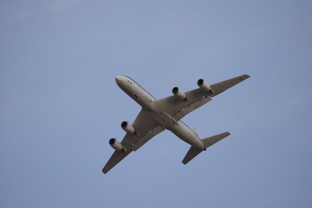 Four-engine jet climbing out after takeoff from Air Force Plant 42 in Palmdale, CA, The Lavatory Los Angeles
