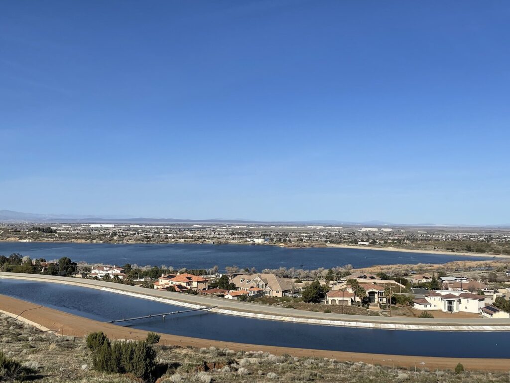 Lake Palmdale and the California Aqueduct with west Palmdale homes and the Antelope Valley floor beyond, Palmdale, CA, The Lavatory Los Angeles