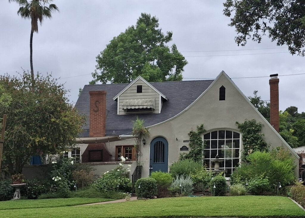1920s storybook style home with a green lawn in the Floral Park neighborhood of Santa Ana, The Lavatory Los Angeles