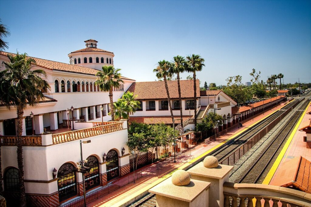 Santa Ana Regional Transportation Center with its tile roofs, palm trees and train platform, The Lavatory Los Angeles
