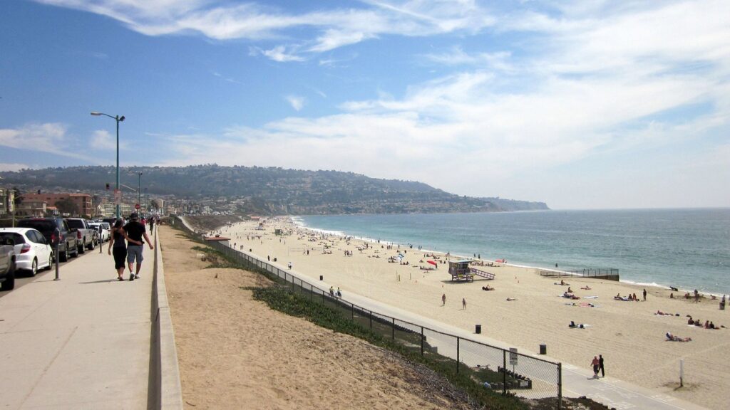 People walking the Esplanade above the beach that runs south to Torrance Beach and Palos Verdes, The Lavatory Los Angeles