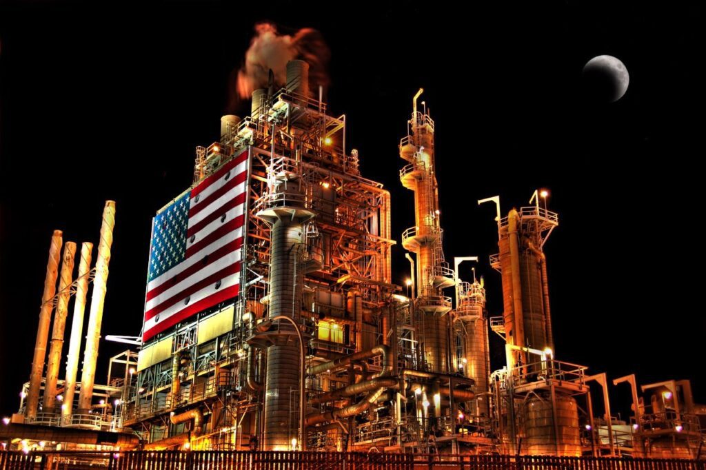 Refinery towers lit up at night along the 405 in Torrance, The Lavatory Los Angeles